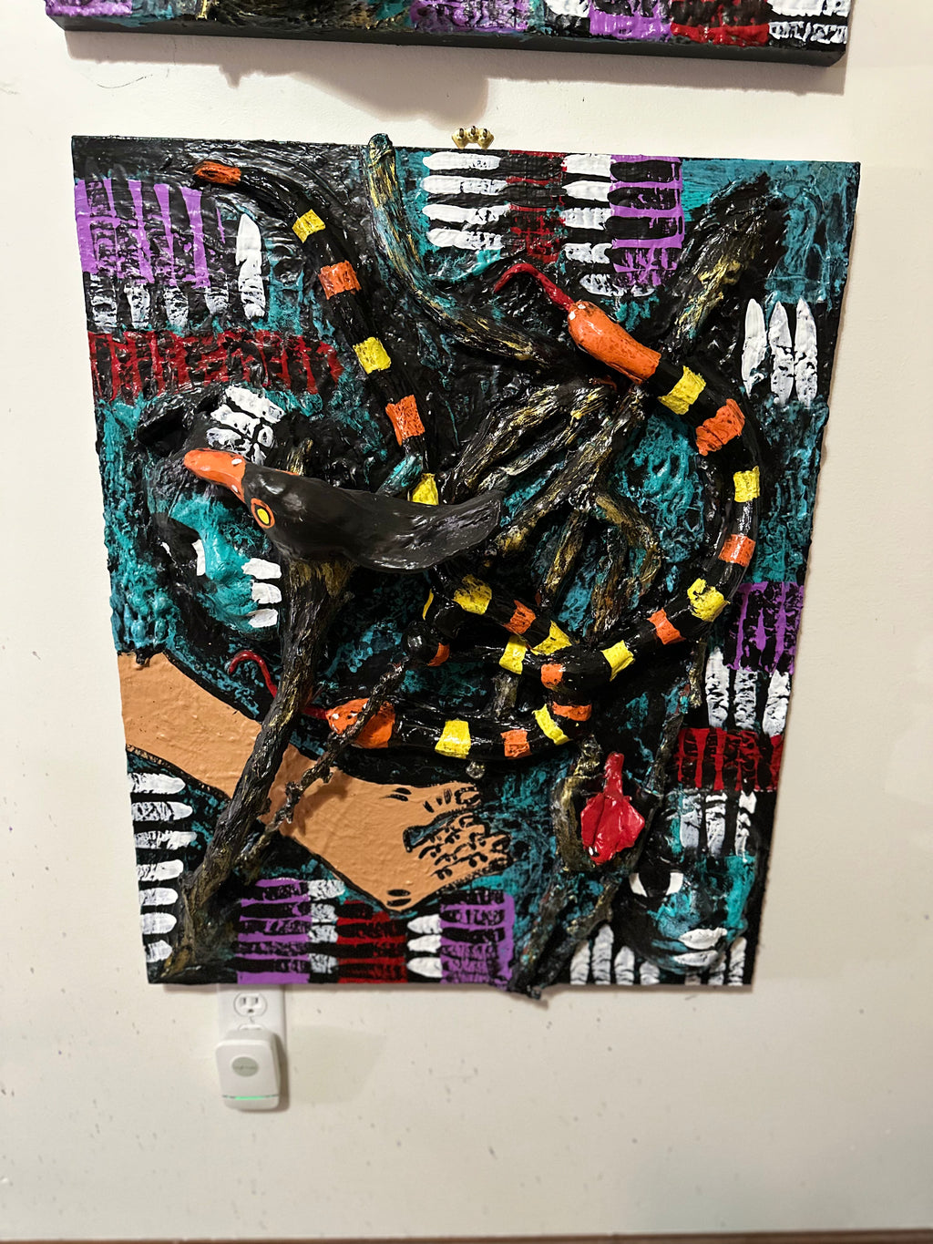 Abstract artwork with a bird and snake on a colorful background